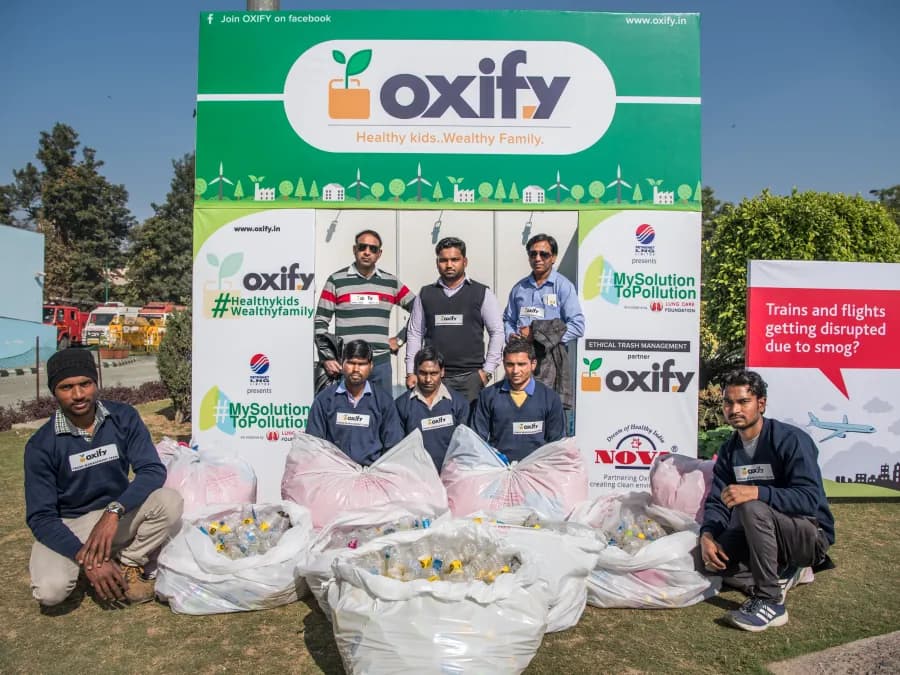Students assembled on the field during the pollution awareness event.